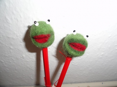 Gefilzte Froschköpfe