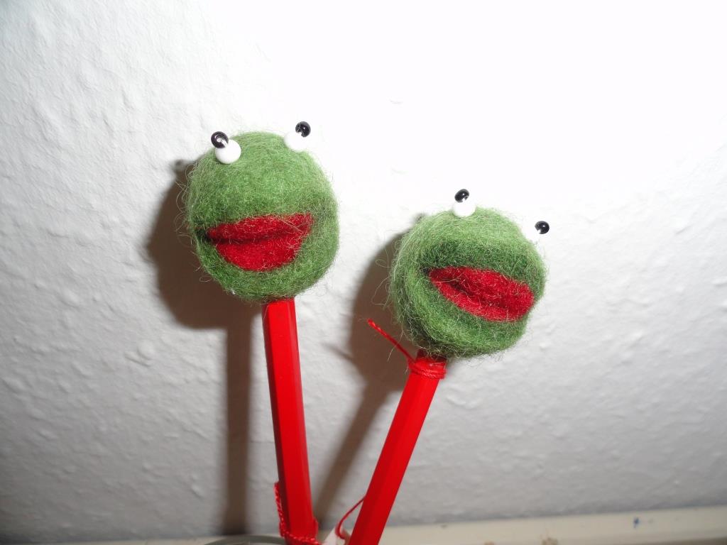 Gefilzte Froschköpfe